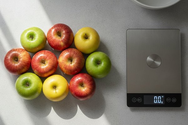 Combien pèse une pomme ? Poids moyen par calibre et variété